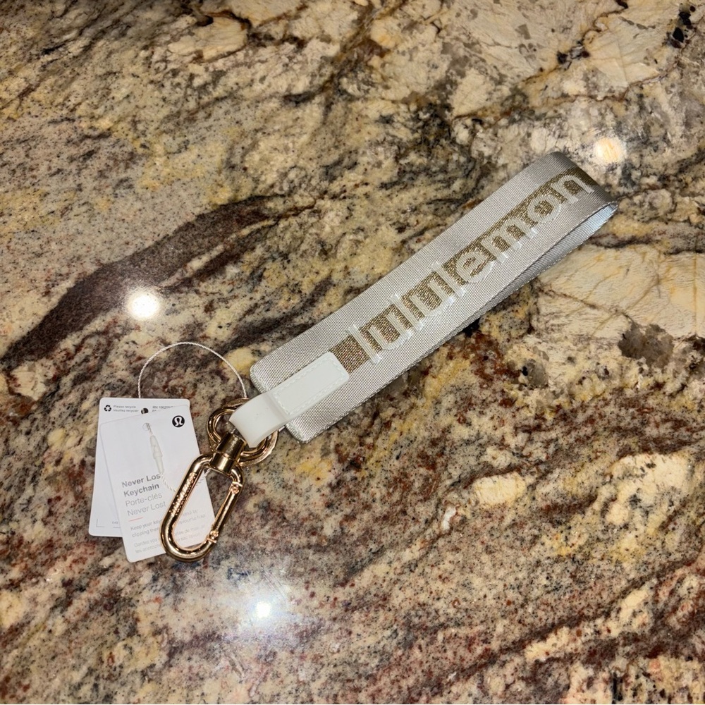 Lululemon Never Lost Keychain Vapor Gold Brand New NWT - Picture 3 of 5